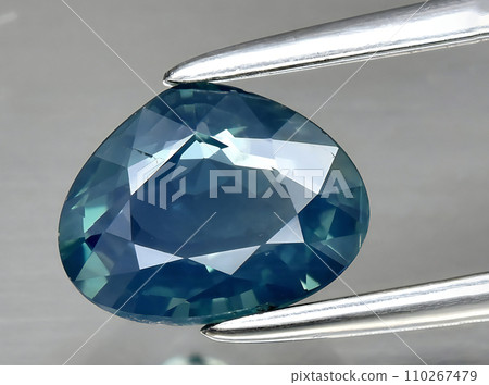natural blue sapphire gem on the background natural blue sapphire gem on the background 110267479