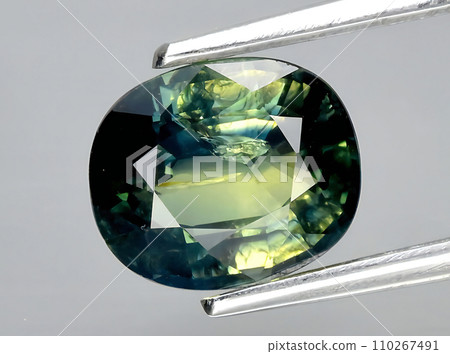 natural bi color sapphire gem on the background 110267491