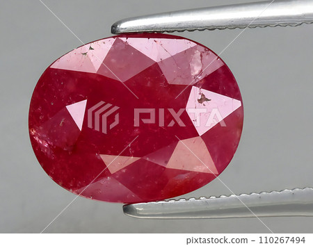 natural red ruby gem on the background 110267494