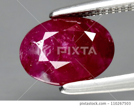 natural red ruby gem on the background 110267503