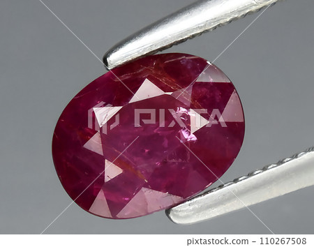 natural red ruby gem on the background 110267508