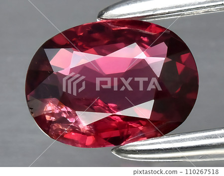 natural red ruby gem on the background 110267518