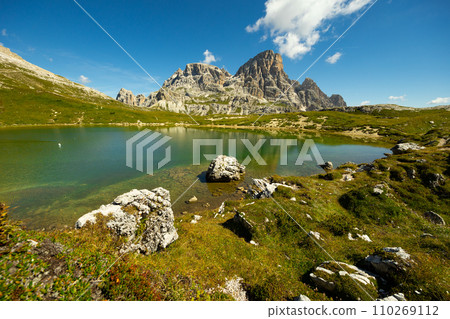 Clear emerald-turquoise pond water in Laghi dei piani area 110269112