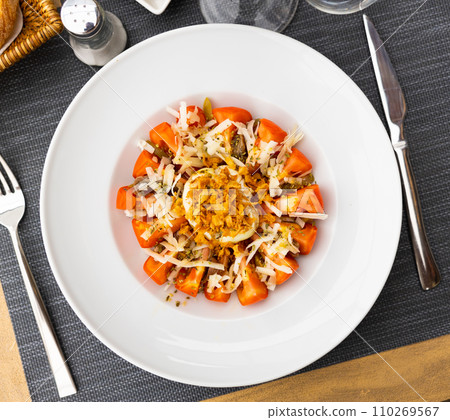 Salad made of tomato and deviled egg served on table 110269567