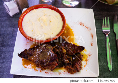 Beef stew served with mashed potatoes at plate 110269709
