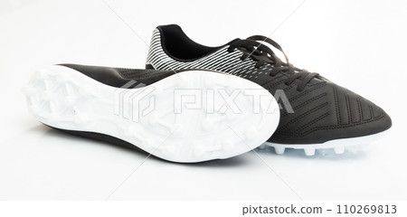 Football boots with studs isolated on white background 110269813