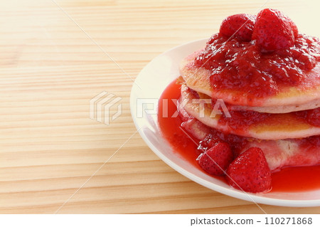 Strawberry pancakes with strawberry sauce 110271868