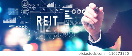 REIT - Real Estate Investment Trust theme with a businessman holding a marker 110273530