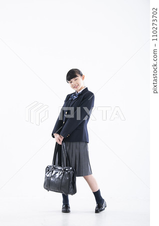 Junior high school girl portrait white background girl junior high school student looking at camera Junior high school girl portrait white background girl junior high school student looking at camera 110273702