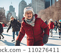 A group of cheerful senior multi-ethnic friends men and women enjoy ice skating in a city park rink with skyscrapers in the background 110276411