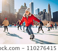 A group of cheerful senior multi-ethnic friends men and women enjoy ice skating in a city park rink with skyscrapers in the background 110276415