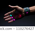 Futuristic wearable tech on a human hand displaying holographic interface. A sleek wristband with a digital screen casts neon pink and blue lights onto the fingers, showcasing advanced biotechnology 110276427