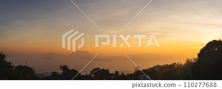 travel and people activity concept with panorama view twilight sky before sunrise with mountain and fog on foreground 110277688