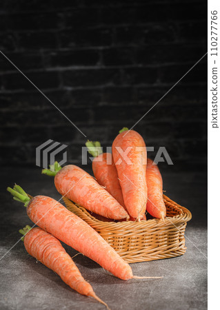 fresh carrots on black background 110277766