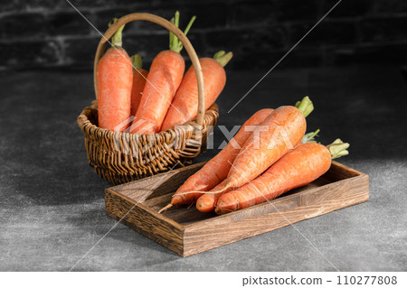 fresh carrots on black background 110277808