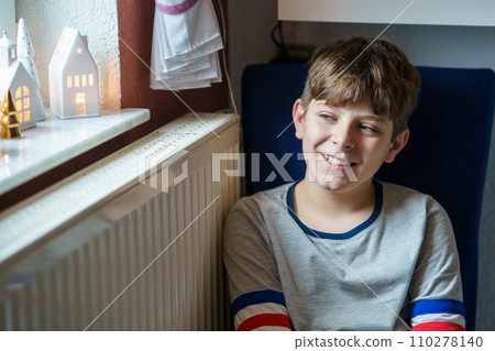 Portrait of preteen school kid boy. Beautiful happy child looking at the camera. Schoolboy smiling. Education concept. Portrait of preteen school kid boy. Beautiful happy child looking at the camera. Schoolboy smiling. Education concept. 110278140