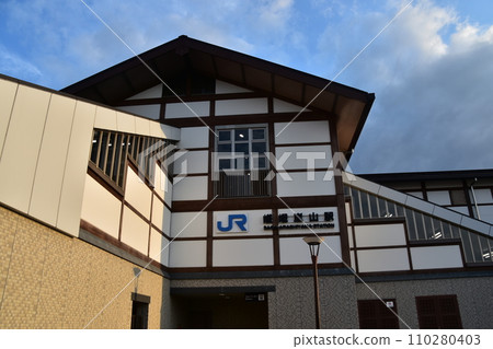 Kyoto in spring in Japan: Saga Arashiyama station building and rotary in front of the station 110280403