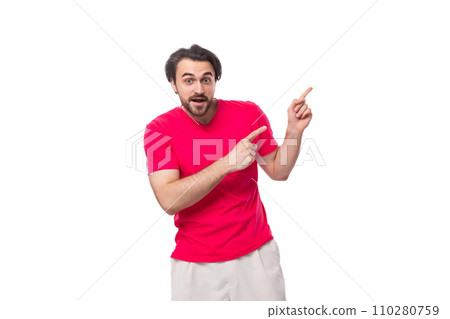 young slender smart brunette advertiser man dressed in a red t-shirt with a mockup young slender smart brunette advertiser man dressed in a red t-shirt with a mockup 110280759