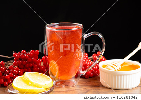 Vitamin berry viburnum tea with honey and lemon Vitamin berry viburnum tea with honey and lemon 110281042