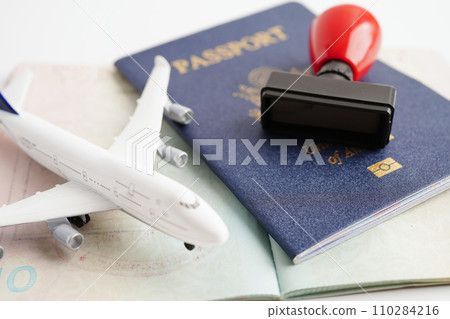 Visa and passport document to immigration at airport in country. Visa and passport document to immigration at airport in country. 110284216