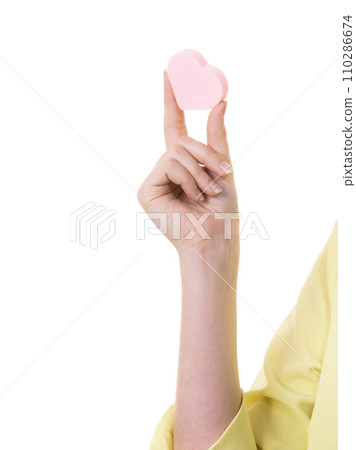 Person holding heart sponge Person holding heart sponge 110286674