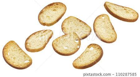 Bruschetta crackers, falling bread croutons isolated on white background, full depth of field Bruschetta crackers, falling bread croutons isolated on white background, full depth of field 110287585