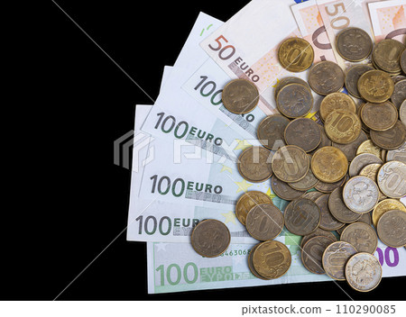Euro banknotes and iron 10 rubles coin (written ten rubles, Bank of Russia in the Russian), isolated on black background Euro banknotes and iron 10 rubles coin (written ten rubles, Bank of Russia in the Russian), isolated on black background 110290085