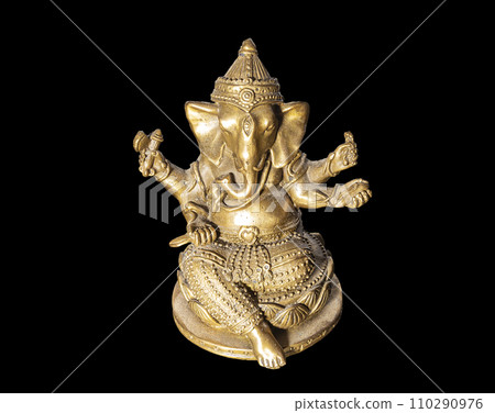 Hindu God Ganesh (Ganesha) Statuette, isolated on a black background Hindu God Ganesh (Ganesha) Statuette, isolated on a black background 110290976