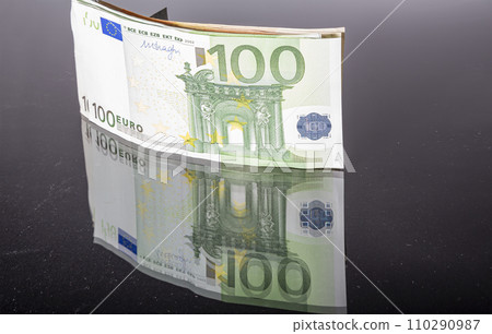 Euro banknotes, close-up, isolated on black background Euro banknotes, close-up, isolated on black background 110290987