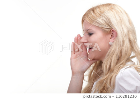 woman with hand close to mouth woman with hand close to mouth 110291230