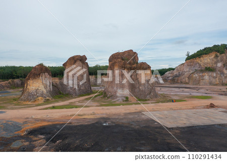 Aerial top view of ground in the land with sand in factory industry for construction site. Arid pattern texture background. Bulldozer tractor Aerial top view of ground in the land with sand in factory industry for construction site. Arid pattern texture background. Bulldozer tractor 110291434