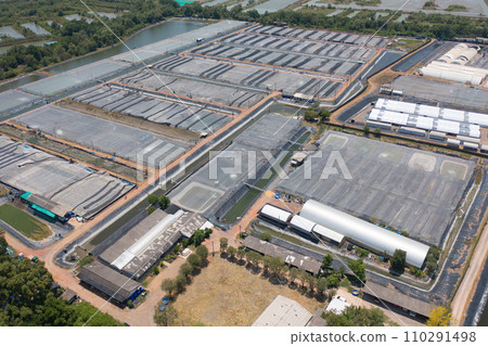Aerial top view of metropolitan provincial waterworks industry factory in urban city town. Water utilities service. 110291498
