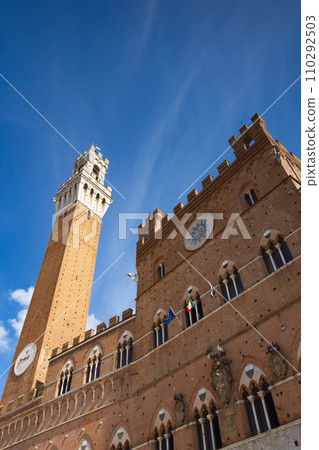 Bell tower of the Palazzo Pubblico in Siena, Italy 110292503