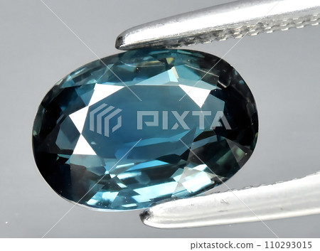natural blue sapphire gem on the background natural blue sapphire gem on the background 110293015