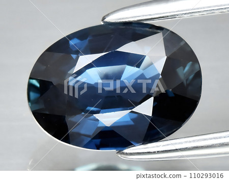 natural blue sapphire gem on the background natural blue sapphire gem on the background 110293016