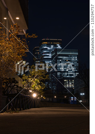 Cafe restaurant storefront and night view of Nakanoshima skyscrapers 110294757