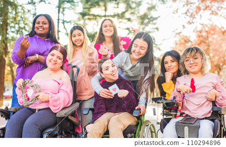 International womens day Inspire Inclusion multiethnic group do love heart with hands. Wheelchair International womens day Inspire Inclusion multiethnic group do love heart with hands. Wheelchair 110294896