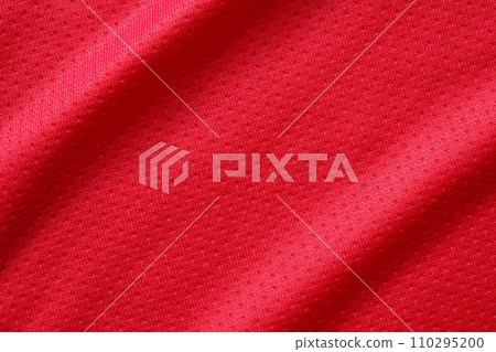 Red sports clothing fabric football shirt jersey texture close up Red sports clothing fabric football shirt jersey texture close up 110295200