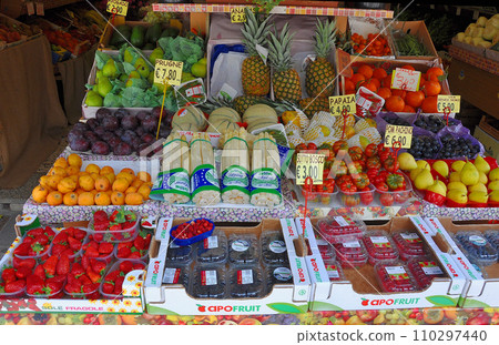 A small fruit shop on a street corner in Milan, Italy A small fruit shop on a street corner in Milan, Italy 110297440