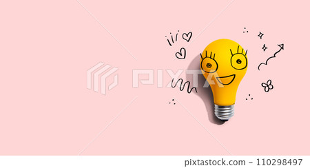 Yellow light bulb with happy face 110298497