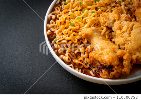 Korean instant noodles with fried chicken or Fried chicken ramyeon Korean instant noodles with fried chicken or Fried chicken ramyeon 110300758