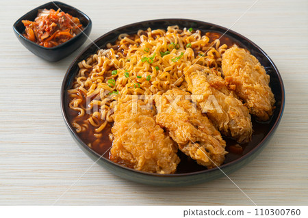Korean instant noodles with fried chicken or Fried chicken ramyeon Korean instant noodles with fried chicken or Fried chicken ramyeon 110300760