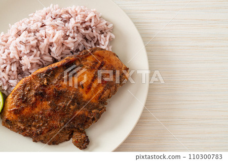spicy grilled Jamaican jerk chicken with rice spicy grilled Jamaican jerk chicken with rice 110300783