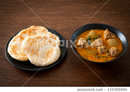 Chicken curry soup with roti Chicken curry soup with roti 110300984