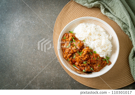 chicken tikka masala with rice on plate chicken tikka masala with rice on plate 110301017