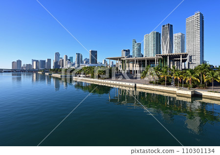 City of Miami, Florida reflected in calm water of Biscayne Bay on sunny morning. 110301134