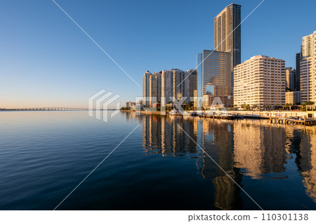 City of Miami, Florida skyline reflected in Biscayne Bay at sunrise. 110301138