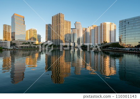 City of Miami, Florida skyline reflected in Biscayne Bay at sunrise. 110301143