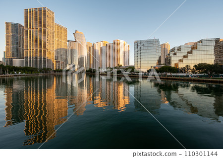 City of Miami, Florida skyline reflected in Biscayne Bay at sunrise. 110301144