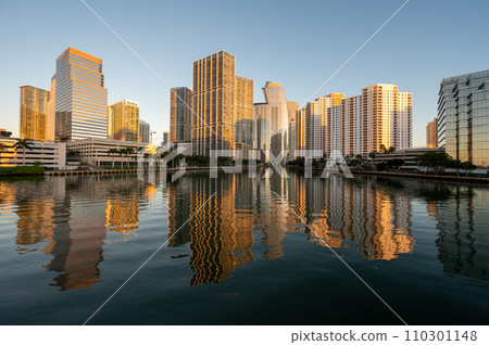 City of Miami, Florida skyline reflected in Biscayne Bay at sunrise. City of Miami, Florida skyline reflected in Biscayne Bay at sunrise. 110301148
